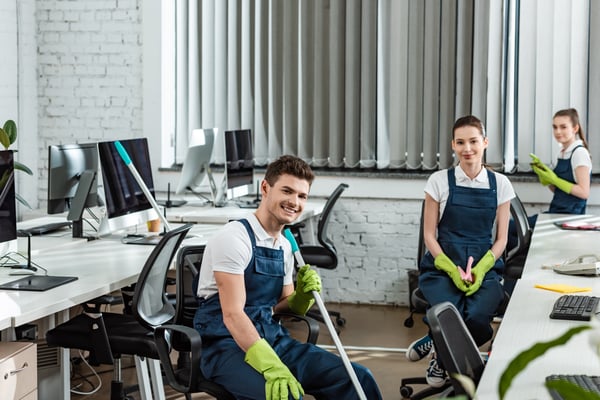 cleaners sitting in office taking a break 