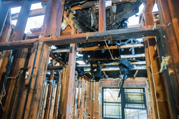 interior of a burned wooden beams an apartment building