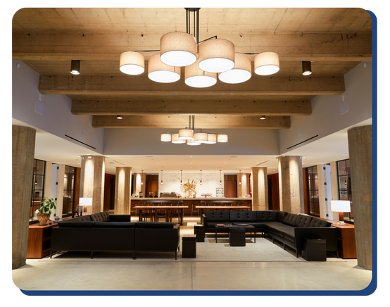 Spacious, immaculately maintained hotel lobby with modern lighting and clean seating, highlighting high standards in shared space cleanliness.