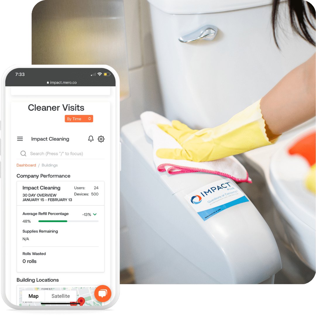A person wearing yellow gloves cleans a toilet with a white cloth. In the foreground, a smartphone displays a cleaning management app showing visit details and company performance for Impact Cleaning.