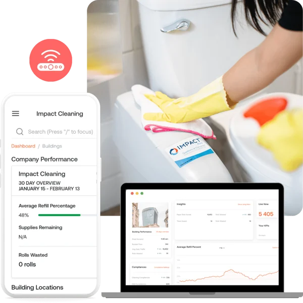 A person wearing yellow gloves cleans a toilet in a bathroom. In the foreground, a smartphone and a laptop display cleaning company performance dashboards and statistics.